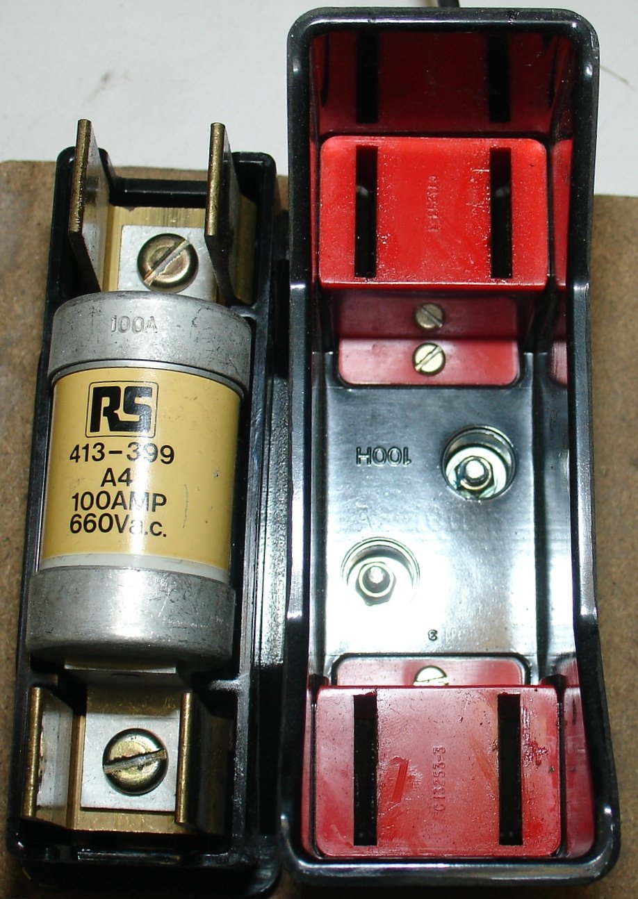 100 amp DC fuse in an open holder for solar battery protection.